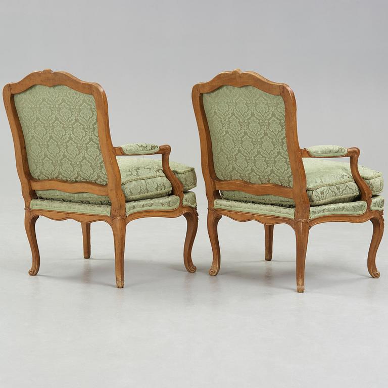 A pair of Louis XV 18th century armchairs.