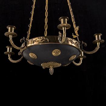 A Empire style ceiling light from year 1900. Height ca 17 cm.