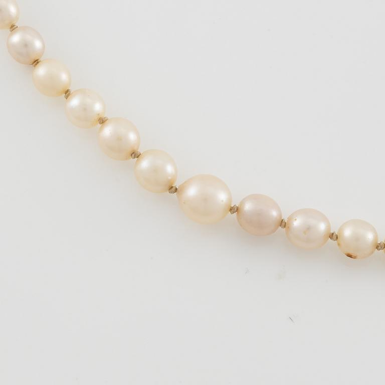 Pearl necklace, graduated pearls, clasp silver with pyrite.