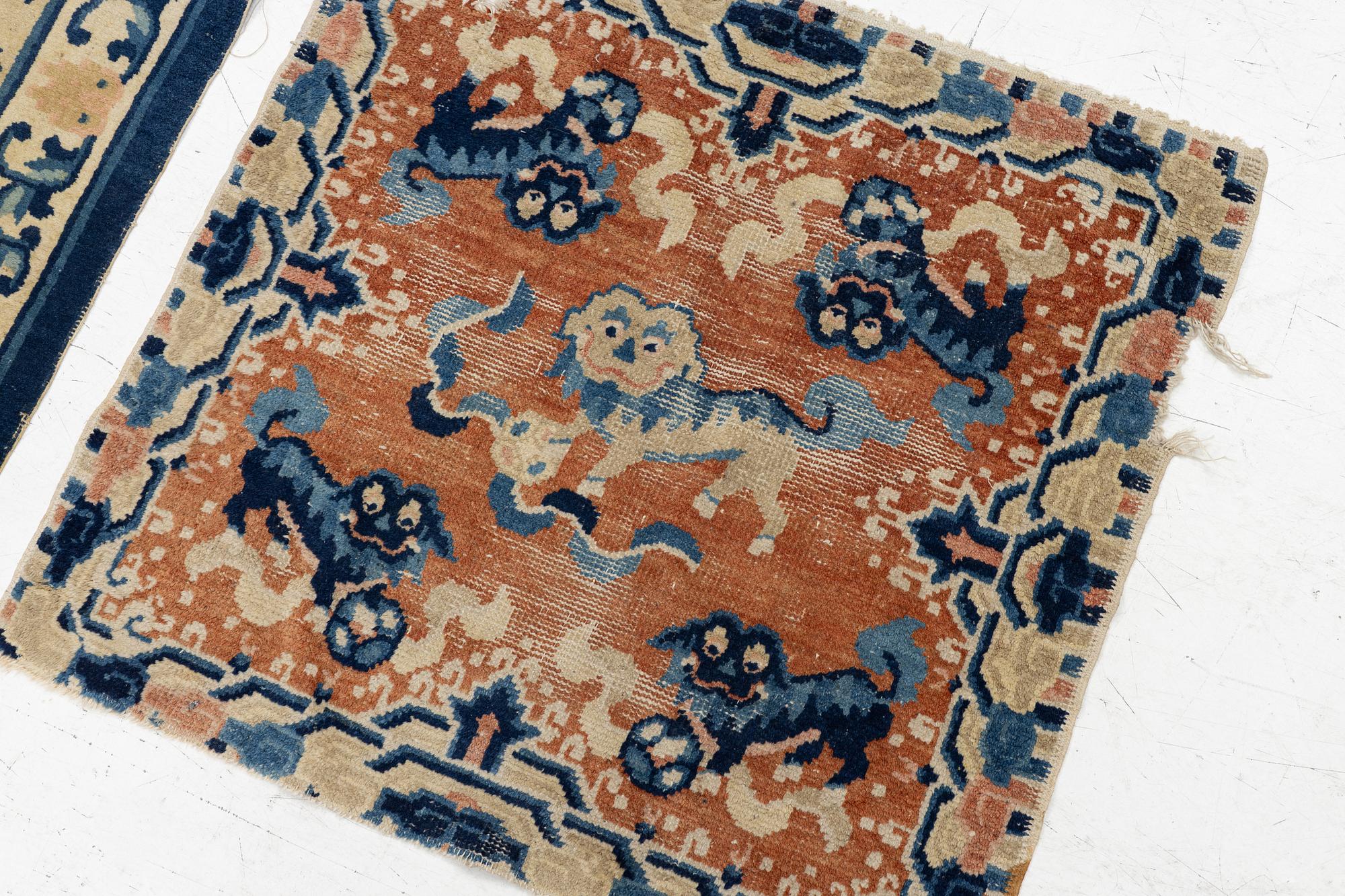 Two Chinese carpet fragments, late Qing dynasty.