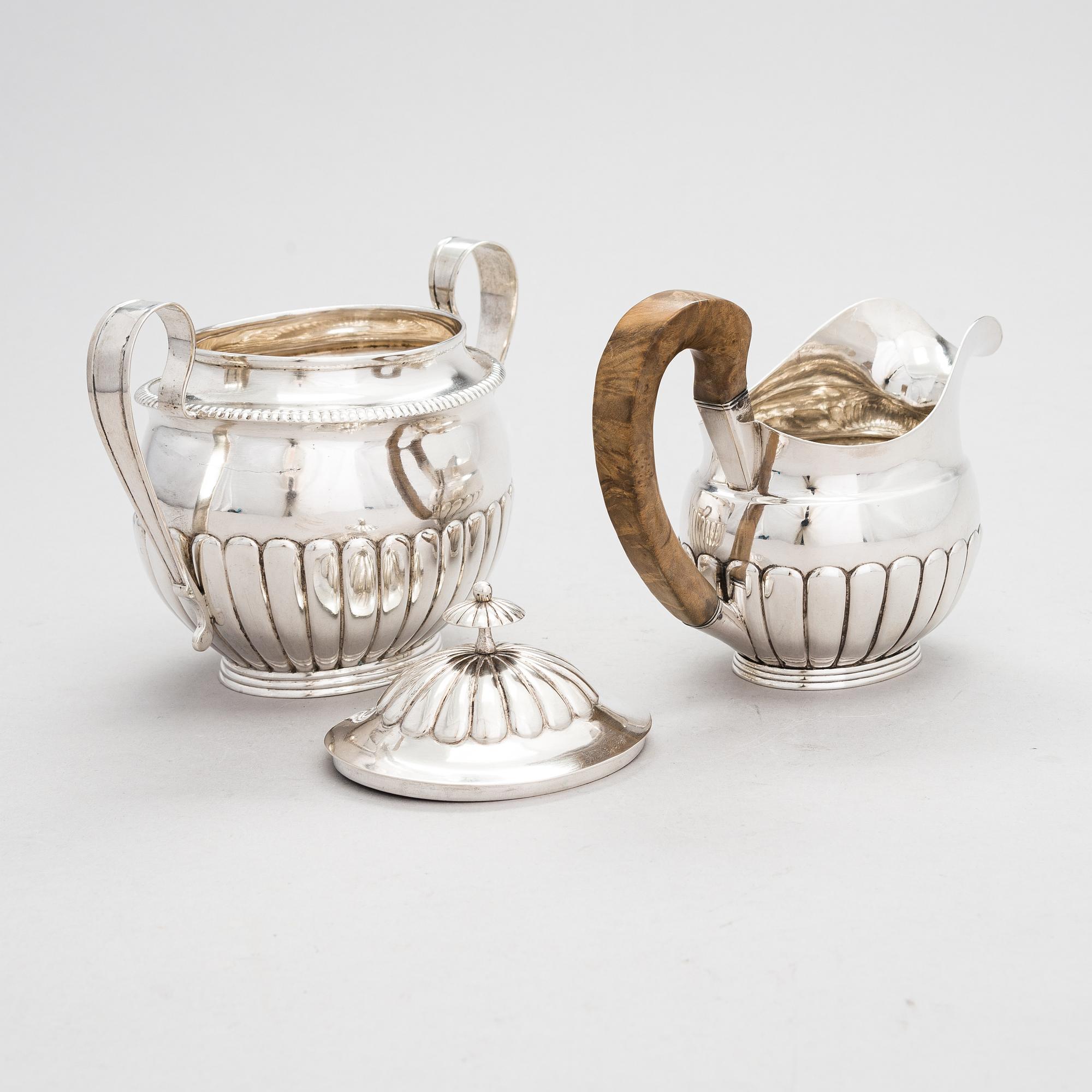 A cream jug and a sugar bowl, maker's mark of Petter Turulin, Sortavala 1824 and 1827.
