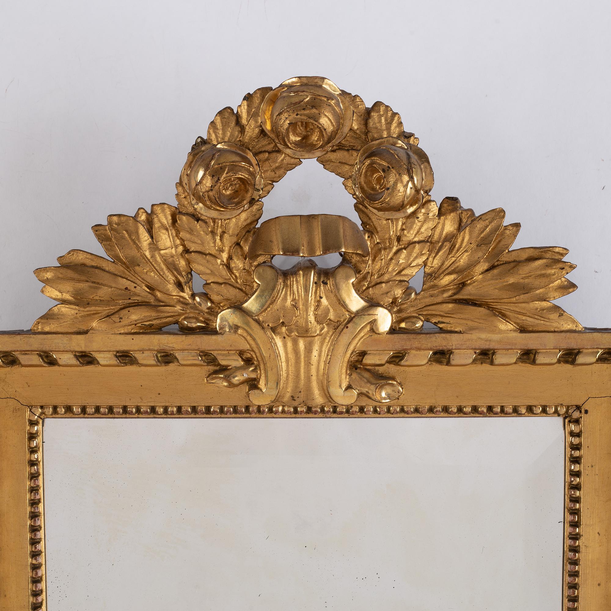 A Gustavian style gilded and bronzed scone, first half of 20th century.