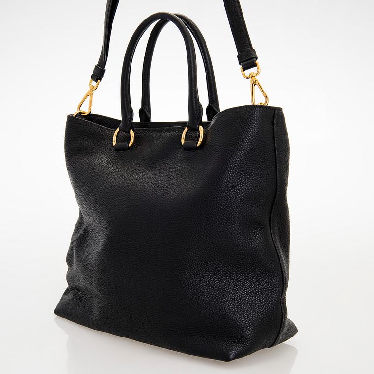 Prada, A 'Vitello Daino Tote' bag.