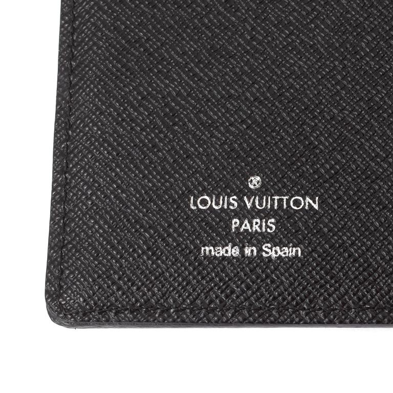 Black epi-leather small ring agenda cover by Louis Vuitton 2015.