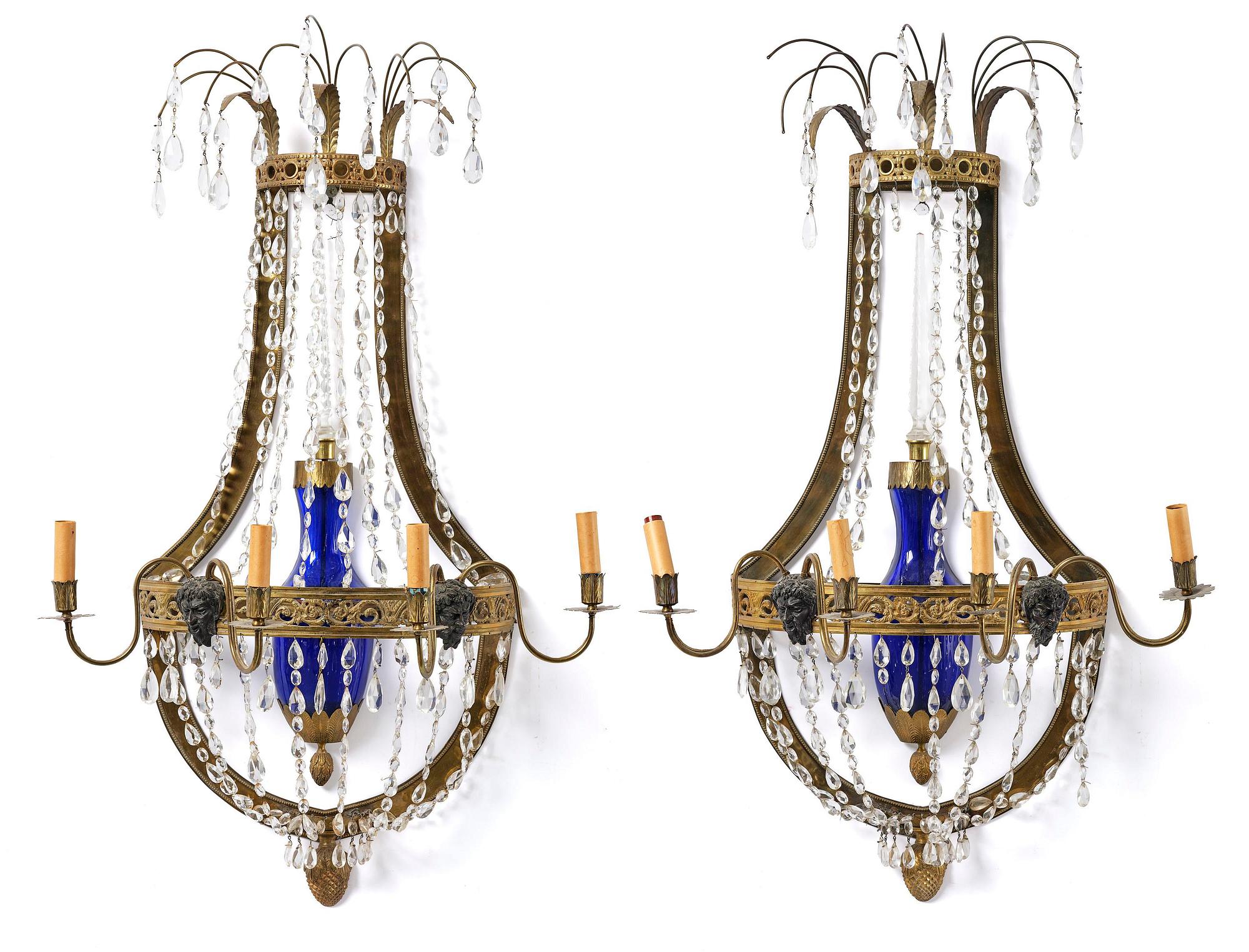 A pair of Russian Louis XVI-style  four-branch gilt bronze appliques, 19th century.