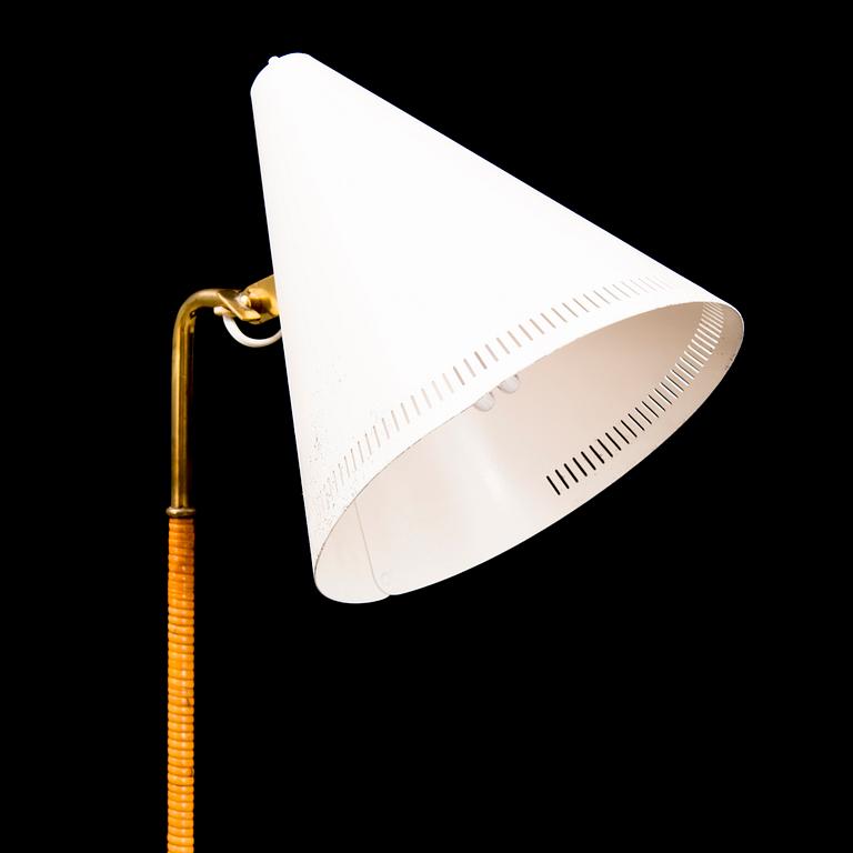 A mid-20th century 'K10-10' standard lamp for Taito, Finland.