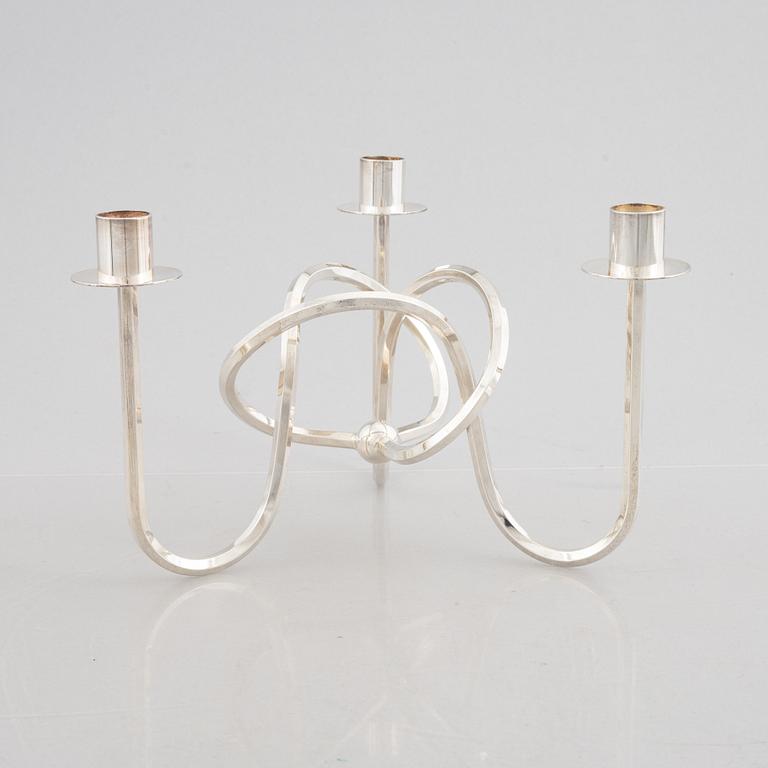 Josef Frank, candelabra, "The Knot of Friendship", silver-plated metal, Firma Svenskt Tenn.