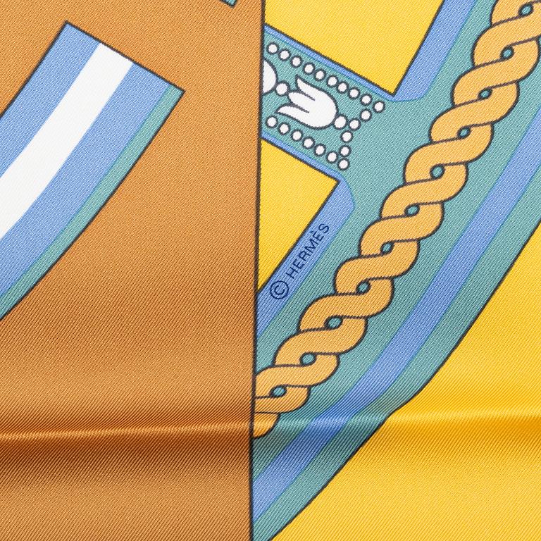 Hermès, a 'La Berline Bayadère' twill silk scarf.