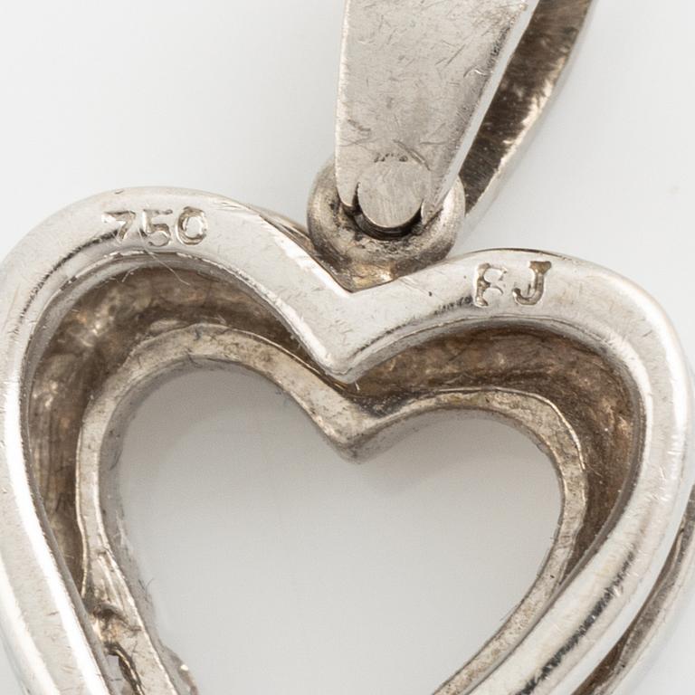 White gold and brilliant cut diamond heart pendant.