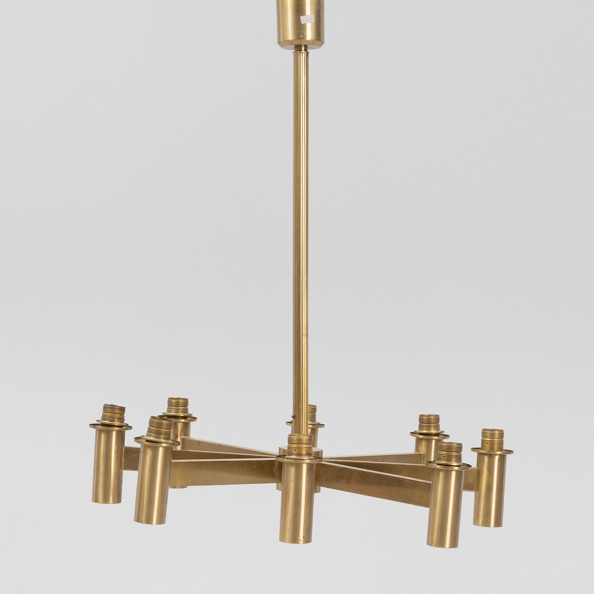Hans-Agne Jakobsson, an eight-light brass ceiling light from Markaryd, Sweden.
