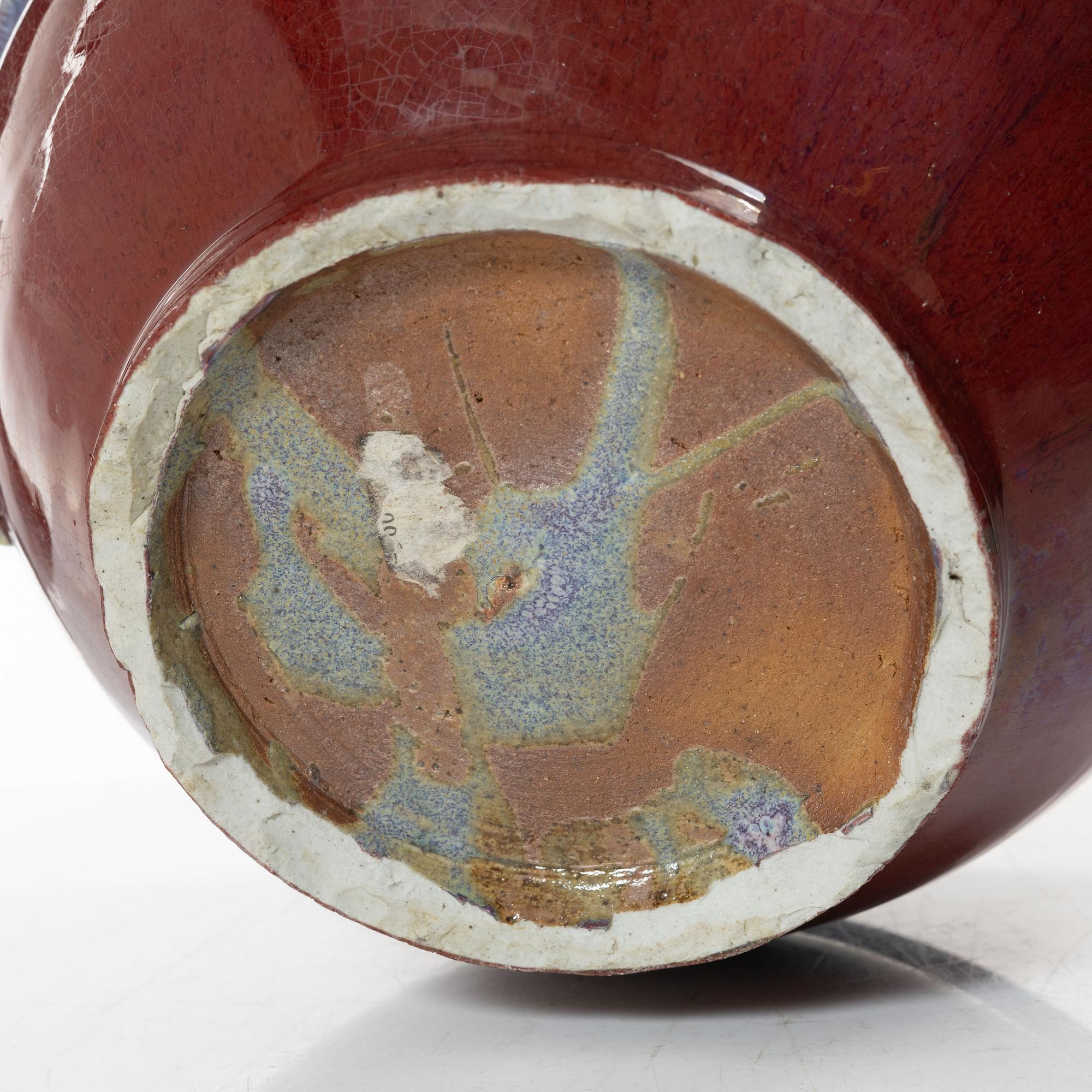 A Chinese sang de boeuf stoneware bowl / flowerpot, 20th century.