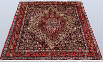 A Senneh rug, approx. 155 x 130 cm.