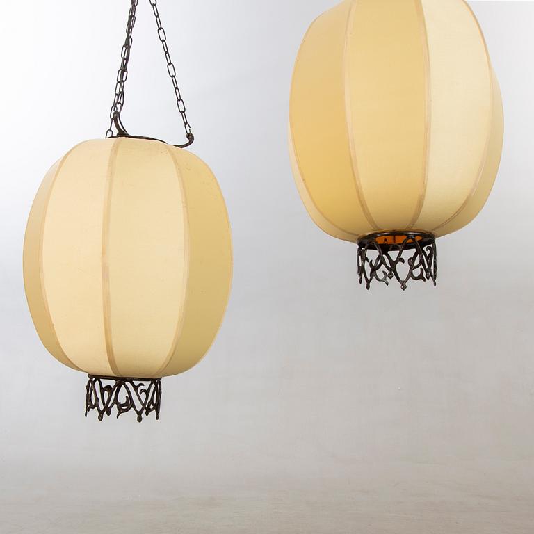A pair of Chinese 20th century ceiling lamps.