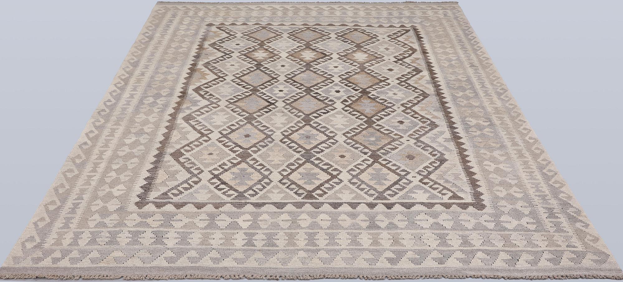 A Kilim rug, approx. 292 x 206 cm.