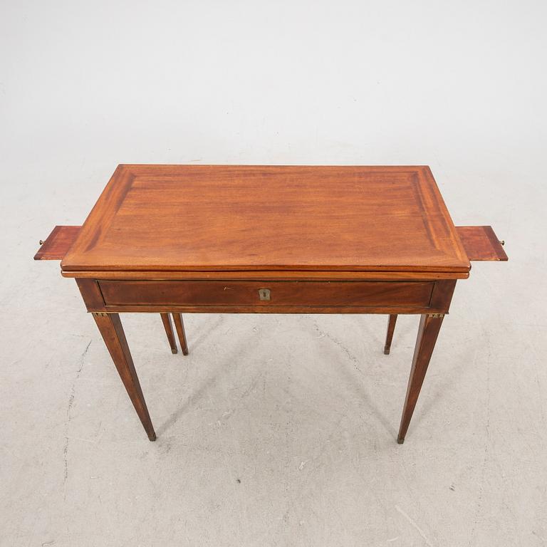 A late Gustavian mahogany game table first half of the 19th century.
