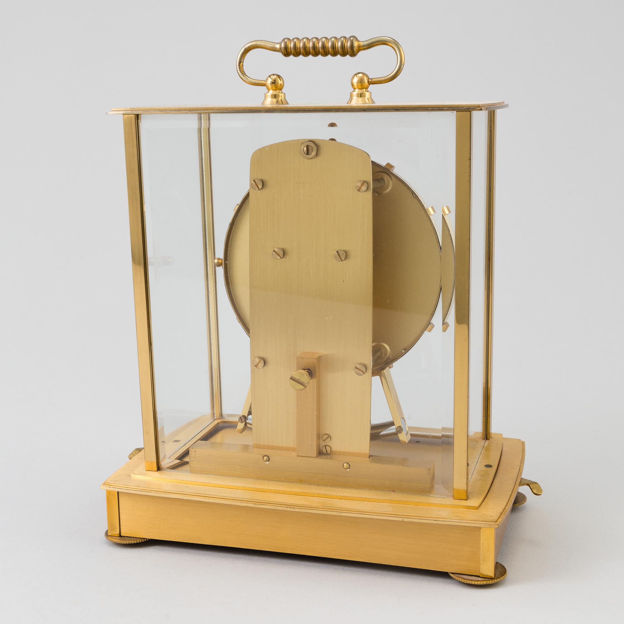 A table clocks, brass, Kundo, 20th century.