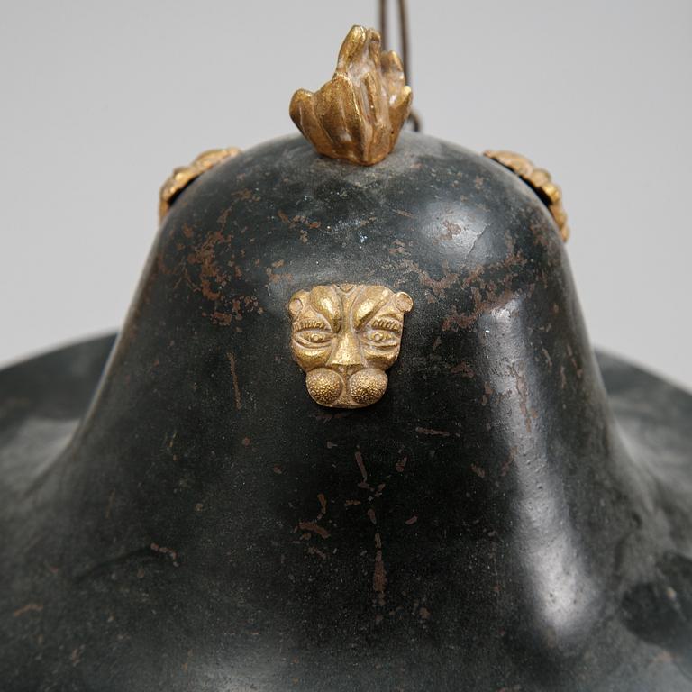 A Swedish Empire style 20th century three-light patinated brass hanging-lamp.