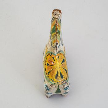A painted folk art dala horse first half of the 20th century.