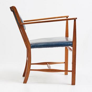 Josef Frank, a mahogany and blue leather chair for Firma Svenskt Tenn, Sweden probably 1950-60's.