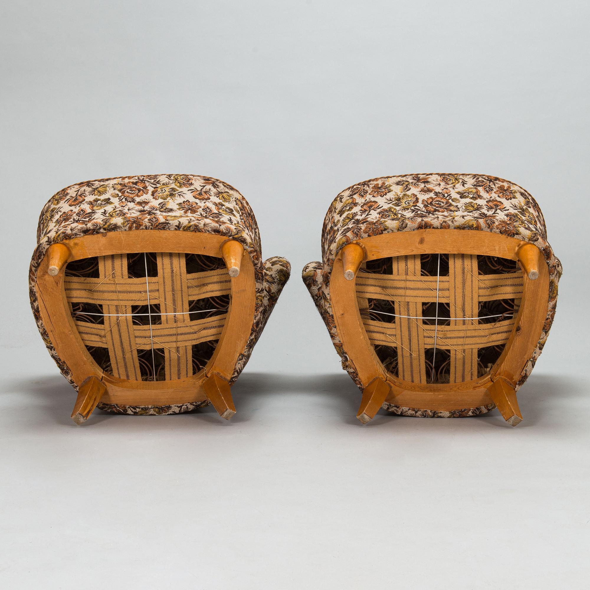 A pair of 1950's armchairs.