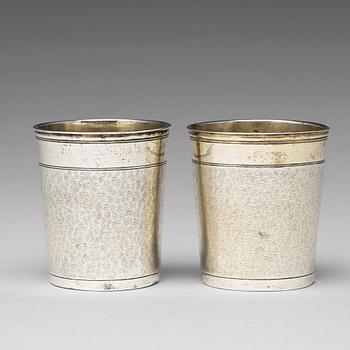 A matched pair of German 17th century parcel-gilt silver, Augsburg (1627-1665).