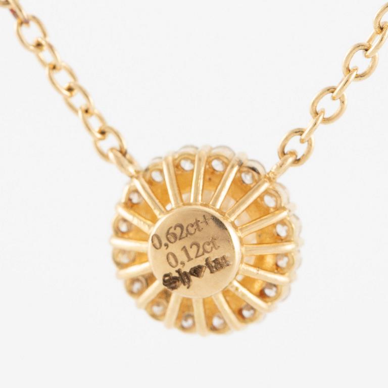 Collier 18K guld med briljantslipade diamanter.