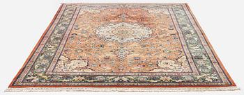 A part silk Tabriz carpet, c. 268 x 179 cm.