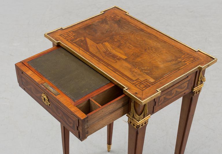 A Louis XVI-style circa 1900 occasional table.