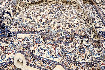 A CARPET, Nain part silk, s.k 9 LAA, 588 x 393 cm.