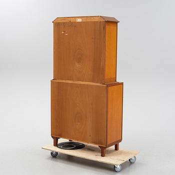 Carl Malmsten, a 'Mittens Rike' mahogany veneered cabinet, Åfors Möbelfabrik, Blomstermåla, dated 1957.