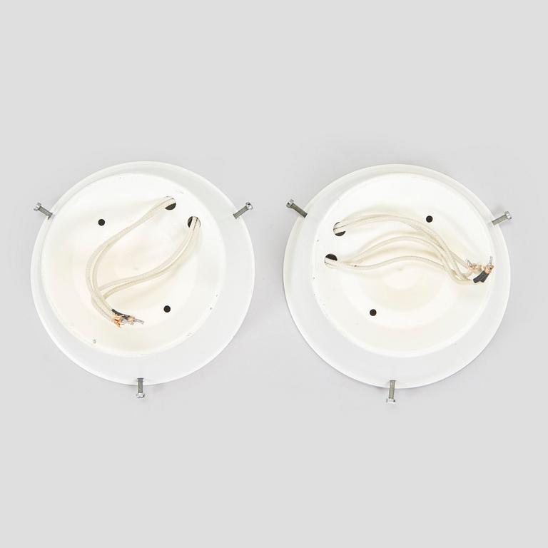 Arne Jacobsen, a pair of ceiling lamps/wall lamps, "AJ-Eklipta", Louis Poulsen, Denmark.