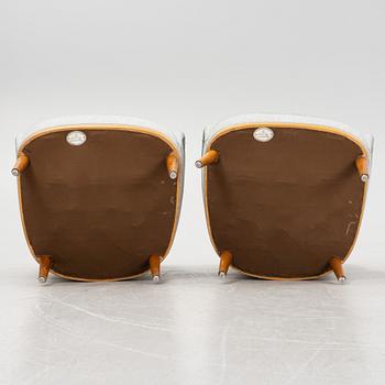 Carl Malmsten, attributed to. A pair of inlay easy chairs, mid 20th Century.