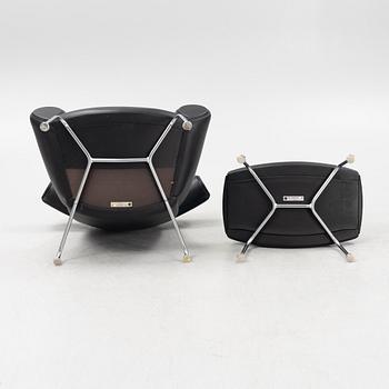 Hans J Wegner, an 'Ox Chair' and an ottoman, for Erik Jørgensen, Denmark, 2005 and 2010.