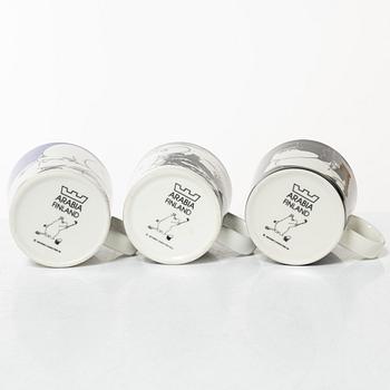 A set of 24 Moomin mugs, Arabia, Finland.