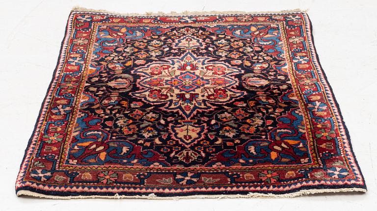A Sarouk/Jozan rug, c. 86 x 64 cm.