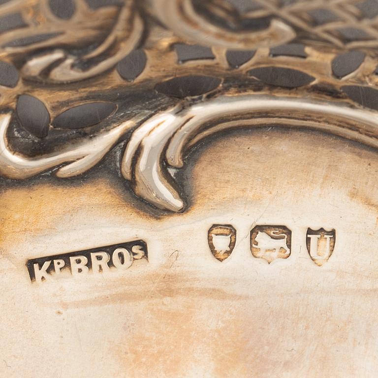 A set of five silver items, including Kemp Brothers, London, England 1895.
