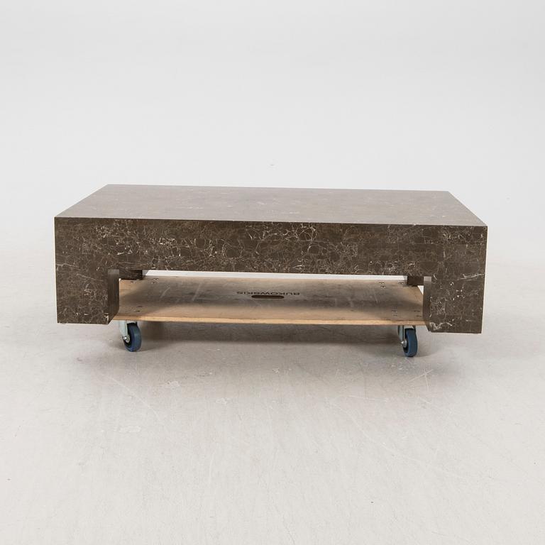A late 20th century travertine coffee table.