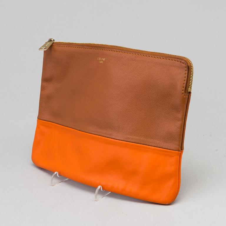 A leather Céline clutch.