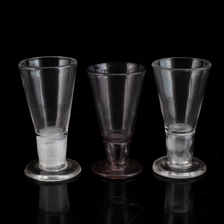 Six similar 18th century wine glasses.