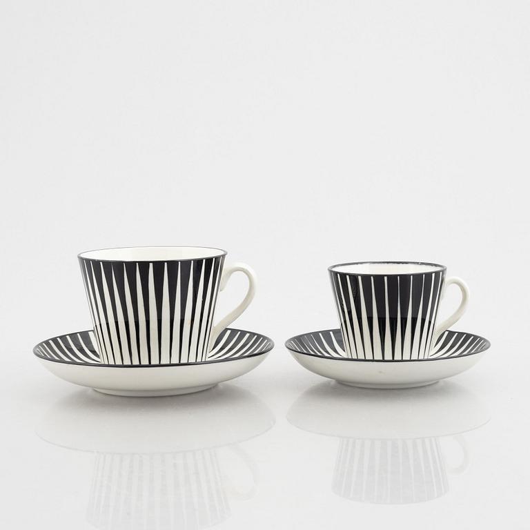 Eugen Trost, three creamware coffee cups with saucers and four tea cups with saucers, "Zebra", Upsala-Ekeby, Sweden.