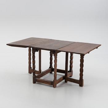 A baroque gate-leg table, 18th century.