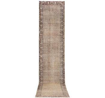 An oriental vintage design runner carpet, c. 460 x 80 cm.