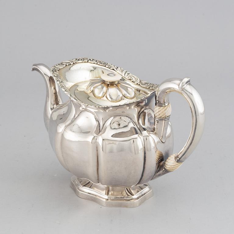 A Russian 19th century parcel-gilt silver tea-pot, mark of Adolf Sper, St. Petersburg 1837.