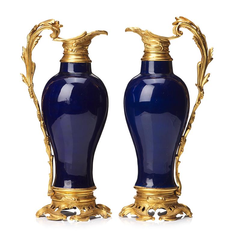 A pair of gilt bronze mounted vases, Qing dynasty, Qianlong (1736-95). French bronze mounts.