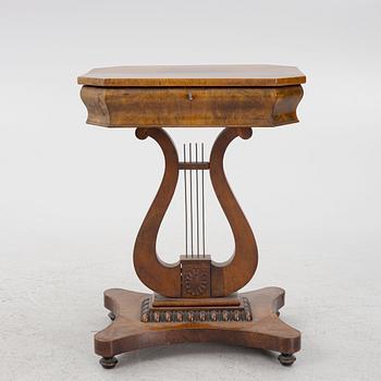 An Empire mahogany sewing table, First part of the 19th Century.