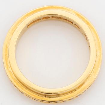 Efva Attling, 18K gold brilliant cut diamond ring.