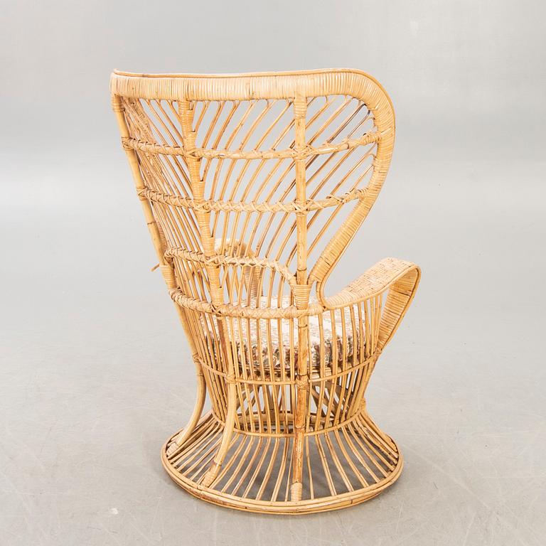 Gio Ponti & Lio Carminati,  a wifker chair for Boncina Itly alter part of the 20th century.