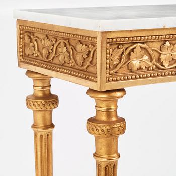 A late Gustavian carved giltwood and marble console table attributed to P. Ljung (1743-1819).