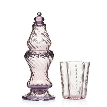 451. An amethyst coloured suger shaker and a cut glass goblet, 18th century.