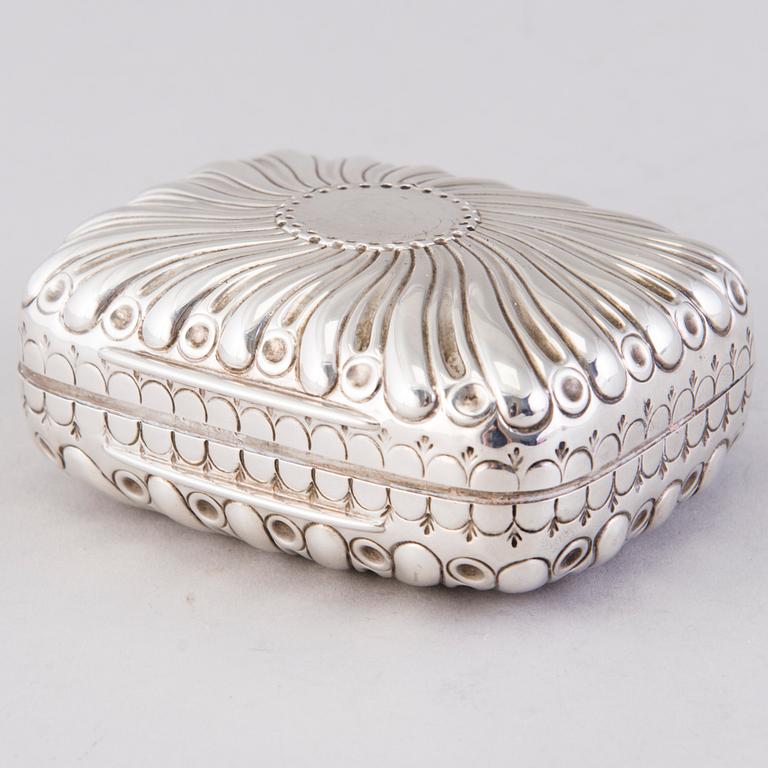 A hinged parcel-gilt soap case, London 1884.